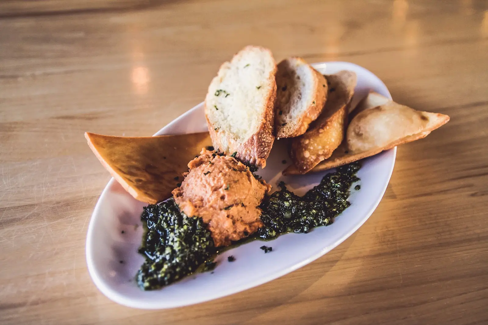 Dip with beer bread crostinis